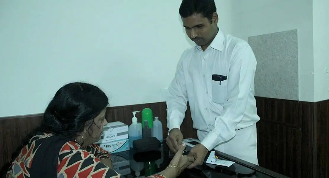 doctor checking pateint